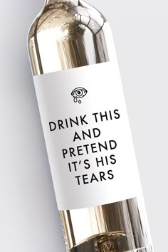 a bottle of wine with a funny message on the label that says drink this and pretend it's his tears