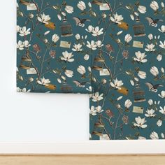 two pieces of wall paper with birds and flowers on them, one is blue and the other is green