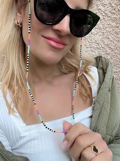 My newest Sunglasses chain is made with colorful beads in a unique color combination that creates a really special chain. I also used elastic loops at the edges of the chain in order to fit perfectly in every type of sunglasses with safety. You can Choose it between three available lengths. Find it only at Christina Christi Store MATERIALS - Black Elastic Loops. - Colorful Beads DIMENIONS - You can choose in three different dimensions for your glasses. (60 - 70 - 80 cm) (23.6'' - 27.5'' - 31.4'' Beaded Sunglasses Chain, Diy Sunglasses, Diy Glasses, Eyeglass Chain Holders, Types Of Sunglasses, Beaded Sunglasses, Eyeglasses Chain, Sunglasses Necklace, Glasses Chains