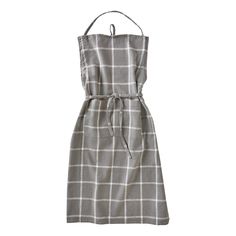 a gray and white checkered dress on a hanger