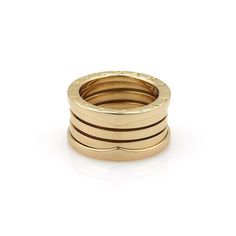 Bvlgari Bulgari B Zero-1 18k Yellow Gold 11mm Band Ring Size EU 51-US 5.25 Bvlgari Bulgari B Zero-1 18k Yellow Gold 11mm Band Ring Size EU 51-US 5.25 Description This authentic Bulgari ring band is finely crafted from 18k yellow gold. It comes from Bvlgari popular B Zero 1 Collection, and features the lovely flex design along with a comfortable 11mm width. Movable central part crafted with the unique Tubogas technique. It has the designer full signature, ring size and metal content. Material: 18k yellow gold. Hallmark: Bvlgari 750 51 Made in Italy Measurements: Band is 11mm wide x 2.8mm high Ring Size: US: 5.25   European: 51 Weight: 11.2 grams Stock#: 57223 Click images to enlarge Payment   We accept payments through Paypal. We only ship to PayPal confirmed billing address.    Florida res Bulgari Ring, Flex Design, Signature Ring, Ring Band, Band Ring, Band Rings, Loose Diamonds, Jewelry Watches, Jewelry Rings