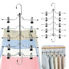 an over the door drying rack with clothes hanging from it's hooks and clips