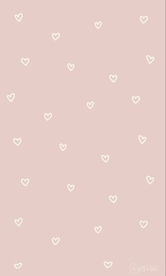 a pink background with white hearts on it