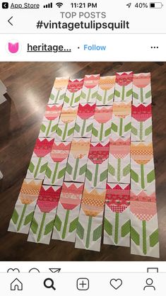 an image of a table runner made out of quilts and paper towels on top of a wooden floor