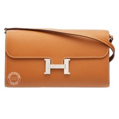 Description HRMS Constance Epsom Long To Go Wallet Brown For Women, Women’s Wallet 8.1in/21cm Rep 1:1 Long wallet in Epsom with removable shoulder strap, 4 credit card slots, 2 pockets, zipped change purse, exterior pocket and gold-tone ‘H’ tab closure. The addition of a removable shoulder strap transforms this iconic style into a multi-functional piece – switch from a classic wallet to a crossbody bag in one fell swoop! 20.5 x 13 x 2 cm / 8.1 x 5.1 x 0.8 inches (Length x Height x Width) Epsom Gold-toned hardware Removable shoulder strap Zipped change purse 4 credit card slots Exterior pocket – Includes box, dust bag. – This product is of the best quality. – The production time is 15-20 working days. – If you want to custom your own bag, please contact us via our fanpage. Louis Vuitton Shirt, Hermes Constance, Change Purse, Hermes Bags, Evening Clutch Bag, Green Bag, Tote Backpack, Long Wallet, Fashion Handbags