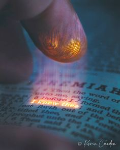 a close up of a person reading a book