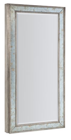 a mirror that is sitting on top of a table with a light blue border around it