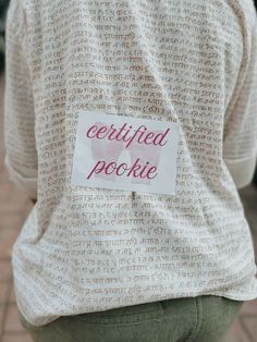 the back of a woman's shirt that says certified pookiie