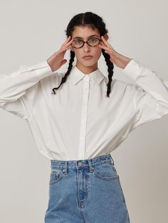 Soft and drapery, this oversized shirt has classic open collar detail and button fastenings through front. Pair yours with any items for essential, casual mood. - Intended for a loose fit- Lightweight, crisp texture- Comfortable dropped shoulders- Voluminous tuck detail at back- Rounded hem with side slits Oversized Classic Blouse, Classic Oversized Collared Shirt, Classic Oversized Blouse, Oversized Collared Classic Top, Oversized Classic Collared Top, Classic Oversized Blouse For Everyday, Oversized Classic Shirt With Fold-down Collar, Oversized Classic Shirt With Fold Down Collar, Classic Oversized Shirt With Fold-down Collar