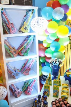 a birthday party with balloons and decorations