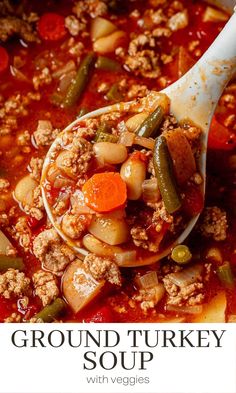 a spoon full of ground turkey soup with veggies in it and the title