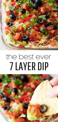 the best ever 7 layer dip recipe in a glass casserole dish with tortilla chips