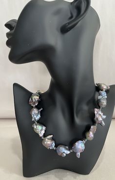 "A real Show Stopper  - Black Baroque Pearl Necklace -  with brilliant iridescence -  Petite Opalescent Swarovski crystals in between each pearl - and finished with a Sterling Silver & Dichroic glass Clasp. Nice Quality Pearls - Hand Selected \"From My hands to Yours\"!" Black Baroque Pearl Necklace, Luxury Beaded Baroque Pearl Jewelry, Elegant Iridescent Necklace For Parties, Silver Baroque Pearl Necklaces For Parties, Silver Baroque Pearl Necklace For Parties, Elegant Iridescent Necklace With Round Beads, Elegant Iridescent Round Bead Necklaces, Elegant Iridescent Jewelry With Pearl Charm, Elegant Iridescent Beaded Jewelry