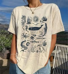 Retro 90s Tattoo Sea Animal Tshirt, Ocean Nature Shirt, Sea Life, Ocean, Whale, Orca, Turtle, Dolphin Shirt, sea animal Comfort Colors Shirt : 100% Cotton (fiber content may vary for different colors) .: Medium fabric (5.3 oz/yd² (180 g/m .: Classic fit .: Runs true to size HOW TO ORDER Pick you favorite design. Review the size & color charts above FIRST and then select shirt size and color from the dropdown menu. Indicate the birthday year in the personalization box. Please note size measuremen Sea Tshirt Design, School Clothes List, Whale Shirt, Surf Tshirt, Nature Shirts, Club Shirts, Retro 90s, Looking Dapper, Animal Tshirt