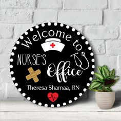 a black and white sign that says welcome to nurses office