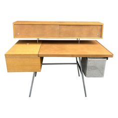 a wooden desk with two drawers and a metal basket underneath the desk top, on an isolated white background