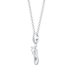 Elevate your ballet core style with this exquisite hand-finished sterling silver pointe shoe charm necklace. This three-dimensional charm is meticulously detailed from every angle, capturing the essence of a vintage pointe slipper. Crafted from 925 sterling silver, this pointe ballerina slipper is the ideal gift for aspiring dancers or a cherished reminder of your own stage dreams. Perfect for ballet core fashion enthusiasts, this elegant charm adds a touch of grace and sophistication to any out Ballet Shoes Necklace, Ballet Jewelry, Core Fashion, Chain Charm Bracelet, Pointe Shoe, Ballet Shoe, Ballet Core, Forever Jewelry, Box Hand