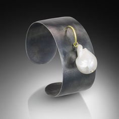 This beauty will take you from day to night with effortless elegance. Stunning and sleek, our oxidized silver cuff has an 18k gold accent that holds the large baroque pearl. Each cuff is one-of-a-kind with a slightly different pearl shape, hand-selected by the artist for your cuff. Details: Oxidized silver cuff with 18k gold White baroque pearl, 14-20mm Available in sm-6”, med-6.5”, lg 7” Dawn Dishwashing Liquid, Pearl Collection, Gold Accent, Effortless Elegance, Oxidized Silver, Silver Cuff, Baroque Pearls, Cleaning Jewelry, Body Oil