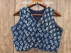 Hand printed indigo pure cotton sleeveless blouse. - Non padded  - Lined - Side zip opening - Margins inside for alteration. Note : These blouses are boutique made to standard measurements, may need some alteration for an individual's specific requirements. Traditional Blue Sleeveless Top, Fitted Indigo Cotton Tops, Indigo Cotton Batik Print Top, Indigo Cotton Top With Batik Print, Blue Padded Cotton Blouse, Indigo Cotton Tops With Batik Print, Indigo Cotton Traditional Tops, Traditional Indigo Cotton Blouse, Traditional Indigo Cotton Top