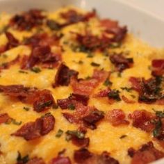 a casserole dish with bacon and cheese