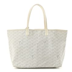 This is an authentic GOYARD Goyardine Saint Louis PM in White. This tote is crafted of Goyard chevron white canvas. The bag has a white leather trim along the top and white leather handles. The top is open to a white canvas interior with a matching removable pouch. Designer White Coated Canvas Bags, Designer White Coated Canvas Shoulder Bag, White Monogram Canvas Shoulder Bag For Everyday Use, Luxury White Bag With Palladium Hardware, White Monogram Canvas Shopping Bag, Everyday White Monogram Canvas Bag, White Monogram Canvas Shoulder Bag With Double Handle, White Shoulder Bag With Canvas Lining For Shopping, Everyday White Monogram Canvas Shoulder Bag