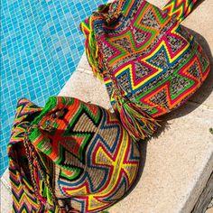 100% Authentic Wayuu Bag Handcrafted By Indigenous Tribe In Colombia. Each Bag Is Unique Art Work That Follows Hundred Years Of Traditions And Believes Of The Tribe. Bag Are Approximately 9 To 13 Inches In Diameter And Depth The Strap Measure Between 32 And 40 Inches. One Of A Kind New Without Tags. Multicolor Bucket Bag For Travel, Woven Vacation Backpack, Handmade Beach Backpack, Brown Woven Backpack, Bohemian Natural Backpack, Natural Bohemian Backpack, Multicolor Tote Bucket Bag For Festivals, Multicolor Bucket Bag For Festivals, Multicolor Bucket Shoulder Bag For Festival