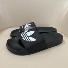 Please See All The Pictures For Details And Measurements. Stored In A Pet And Smoke Free Place. Priority Shipping With Tracking Info. Adidas Slip-on Slides, Adidas Slides With Rubber Sole For Summer, Casual Black Flip Flops For Streetwear, Adidas Black Slides With Logo, Adidas Casual Slip-on Sport Sandals, Black Adidas Logo Sandals, Adidas Casual Open Toe Slides, Casual Adidas Open Toe Slides, Adidas Non-slip Black Slides