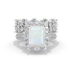 a white opal and diamond ring