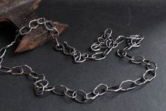 This chain is made entirely by hand. Suitable for different ways of wearing. With a rough look and style. It can be worn by both men and women which makes it great. Material: Silver, Oxidized patina Please, avoid dropping jewelry! S H I P P I N G : All objects are carefully wrapped in a bubble wrap and a box or input in elegant jewelry boxes and orders are shipped via registered priority international mail. Please, keep the jewelry away from perfume and other alcohol containing fluids because th Everyday Handmade Chain Link Necklace, Oxidized Chain Link Necklace For Gift, Handmade Silver Chain Link Necklace, Oxidized Sterling Silver Chain Link Necklace, Hand Forged Silver Metal Chain Necklace, Sterling Silver Oxidized Chain Link Necklace, Handmade Minimalist Link Chain Necklace, Minimalist Handmade Link Chain Necklace, Rustic Silver Handmade Necklaces