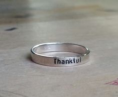 { sterling stacking rings . Personalize rings with names, dates, mantra, inspirational message, etc. } mom rings . personalized name rings . child name stackable rings {ONE} simple sterling ring beautiful for stacking with other rings . custom name(s), date, and or message up to 20 characters . approx. 3mm in width . message only stampable on the outside of the ring {all rings come packaged and ready to gift ~ if shipping directly to gift recipient and you want me to include a note from you just Rings With Names, Mom Rings, Mantra Ring, Mothers Ring, Mom Ring, Mother Rings, Name Rings, You Want Me, Personalized Rings