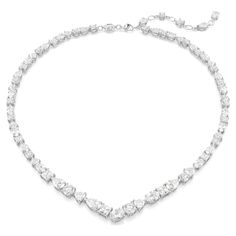 Exquisite refinement is brought to life in this show-stopping jewelry set from the Mesmera family. The necklace is made with a string of eye-catching Swarovski Zirconia on a rhodium plating setting, all produced in a surprising mix of cuts and sizes. For extra luxury, the elongation is completed with a lobster closure and a scattering of Swarovski Zirconia. The light-catching earrings are also rhodium plated, with a bold hanging design featuring luminous pear-cut crystals. Gift this set to a lov Swarovski Millenia Necklace, Elegant Jewelry Silver, Crystal Necklace Designs, Hogwarts Style, Formal Necklace, Charms Pandora, Swarovski Necklace, Luxury Necklace, Holiday Earring