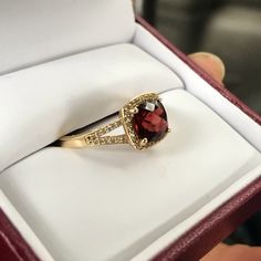 Have A Size 7, Unaltered 10k Gold Ring. The Stones Are All Natural! No “Lab Created” Bs. Has A Large Garnet Center Stone With Diamonds Surrounding. Classic Ruby Ring With Gemstone Accents For Formal Occasions, Formal Ruby Ring With Gemstone Accents, Formal Yellow Gold Ruby Ring With Halo Design, Elegant Cushion Cut Ruby Ring In Yellow Gold, Elegant Ruby Ring With Halo Design For Formal Events, Elegant Formal Ruby Ring With Halo Design, Elegant Garnet Rings With Halo Setting, Elegant Ruby Ring With Halo Design For Gift, Formal 14k Gold Ruby Ring With Halo Design