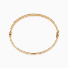 #All The One Bold Bangle is easy to love. With a sleek hinged design, this bracelet will add polished shine to any wrist stack or stand out solo as your go-to solid gold piece. The Finer Points: #YellowGold-14kSolidGold-675 Metal: 14k Yellow Gold Dimensions: 6mm Tube Width, 57mmx48mm Opening Construction: Latch Opening, Figure Eight Closure Weight: 6.2 Grams Crafted in Arezzo, Italy #YellowGold-14kSolidGold-785 Metal: 14k Yellow Gold Dimensions: 6mm Tube Width, 65mmx56mm Opening Construction: La Arezzo Italy, Karat Sizes, Wrist Stack, Wrist Stacks, Gold Piece, Gold Price, Easy To Love, Jewelry Business, Pure Gold