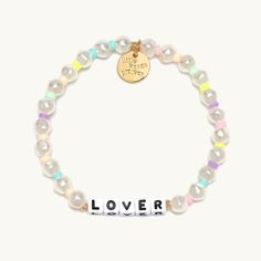 Delicate and dainty, the Lover bracelet is crafted with soft shades of pastel colors as a subtle way to show your love! Put on this bracelet and wear it “forever and ever”! A little reminder to register your bracelet! When you've passed it on, you can track its journey to see who else it's inspired. Lover Bracelet, Little Words Project, Shades Of Pastel, Letter Bead Bracelets, Acrylic Bracelet, Lovers Bracelet, Trending Bracelets, Forever And Ever, Word Bracelet