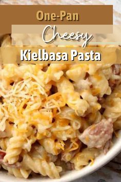 Closeup shot of cheesy kielbasa pasta on plate. Quick Meals With Kielbasa, Simple Smoked Sausage Recipes, Cheesy Pasta And Sausage, Cheese Kielbasa Pasta, Simple Kielbasa Recipes, Quick Keilbasa Recipes, Kielbasa Pasta Crockpot, Easy Kabasa Recipes Dinners, Quick Kielbasa Dinner Ideas