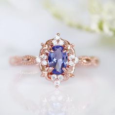 Vintage Tanzanite Ring 14K Rose Gold Vermeil Ring Engagement | Etsy Classic 14k Rose Gold Rings With Accent Stones, Oval Rose Gold Birthstone Ring For Anniversary, Classic Sapphire Wedding Ring With Birthstone, Elegant 14k Rose Gold Sapphire Ring, Classic Halo Ring With Birthstone, Classic Oval Rose Gold Birthstone Ring, Classic Rose Gold Birthstone Ring For Anniversary, Elegant Rose Gold Ring With Birthstone, Heirloom Rose Gold Sapphire Ring For Anniversary