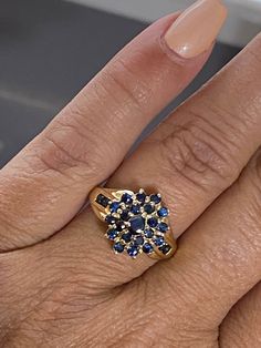 GORGEOUS Vintage 14K Yellow Gold .87 CTW Sapphire Cluster Ring Stunning estate ring with amazing hue blue sapphires! Ring has a .15 ct pear cut Sapphire center stone surrounded by 24 round .03 ct sapphires. .87 CTW! Size 6 Weighs 3.6 grams Please message me with any questions Shipped insured/delivery confirmation I guarantee item to be exactly as described and pictured Formal 14k Gold Cluster Sapphire Ring, Elegant Yellow Gold Cluster Sapphire Ring, Vintage Blue Cluster Ring In 14k Gold, Vintage Gold Cluster Sapphire Ring, Ruby Heart Pendant, Vintage Multi-stone Sapphire Ring In 14k Gold, Sapphire Cluster Ring, Black Opal Pendant, Estate Ring