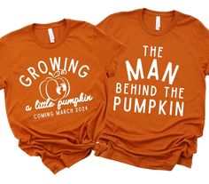 two orange shirts with the words growing and the man behind the pumpkin printed on them