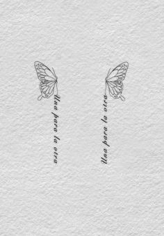 two butterflies with words written on them, one is facing each other and the other is looking