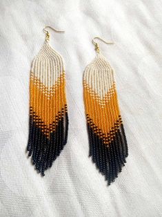 Orange And Black Beads Dangle Earrings, Orange Dangle Beaded Earrings With Black Beads, Bohemian Orange Beaded Earrings With Black Beads, Orange Dangle Earrings With Black Beads, Orange Beaded Fringe Earrings, Boho Fringe, Chevron Patterns, Long Tassel Earrings, Dangly Earrings