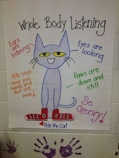 a white sign with writing on it that says, who body listening eyes are looking paws are down and still be grooy