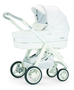 a white baby stroller with black wheels