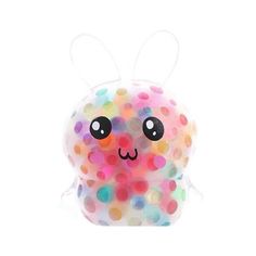 an animal made out of confetti on a white background with lots of colors