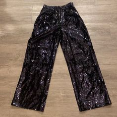 Gorgeous “Navy” Sequin Pants. A Must Have! They’re Absolutely Stunning. I Love Them, But Have To Reposh Because I Cannot Fit The Small. The Pants Were Only Worn Once To A Dinner Party. You Can Dress Them Up Or Dress Them Down. You Won’t Be Disappointed With These Wide-Leg Sequin Pants. They Have Front Pleats In The Waist And Pockets!!! Really Well Made And Beautiful. Originally $250.00. Questions? Leave A Comment Below! Sequined Straight Leg Pants For Night Out, Straight Leg Bottoms For Party Season, Straight Leg Bottoms For Night Out, Straight Leg Pants For Fall Party, Fall Party Pants With Straight Leg, Fall Party Straight Leg Pants, Formal Sequin Straight Pants, Straight Leg Pants For Evening Parties, Straight Leg Pants For Evening And Party Season