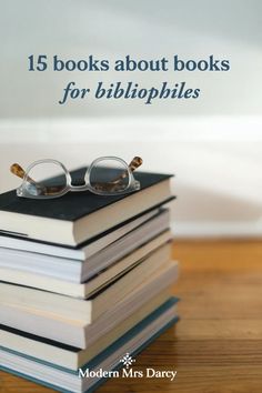 a stack of books with glasses on top and the title reads 15 books about books for biblipies