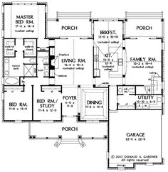 the first floor plan for a home with two master suites and an attached garage area