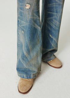 Discover the ultimate **Nevada Cowboy Inspired Spider Web Wash Denim**. These wide and baggy jeans, featuring a unique spider web wash and distressed detailing, are perfect for a bold, vintage look. Made from 100% denim cotton, these unisex jeans come with a slightly ripped hemline and an SP leather patch on the back. Available in various sizes, check out the detailed size chart below for the perfect fit. SIZE (CM) LENGTH WAIST BUTT EXTRA SMALL 101 69 90 SMALL 104 75 96 MEDIUM 106 79 100 LARGE 1 Blue Straight Jeans, Angel Dress, Denim Cotton, Lace Bodice, Leather Patches, Baggy Jeans, Spider Web, Womens Maxi Dresses, Velvet Dress