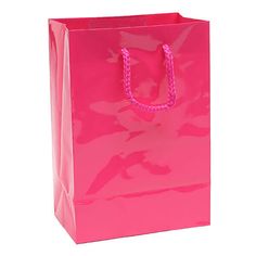 a pink shopping bag on a white background with the handle loop down to it's side