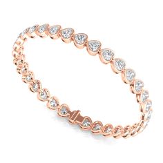 Go ahead, wear your heart on your sleeve with this unique rendition of a classic tennis bracelet. Elegant Rose Gold Heart Cut Bracelet, Classic Heart-shaped Diamond Bracelet For Formal Occasions, Rose Gold Bangle Tennis Bracelet For Anniversary, Luxury Heart Cut Tennis Bracelet For Formal Occasions, Classic Diamond Bracelets For Valentine's Day, Classic Heart Cut Tennis Bracelet For Formal Occasions, Valentine's Day Classic Diamond Bracelet, Classic Rose Gold Bracelets For Anniversary, Classic Round Heart Bracelet For Formal Occasions