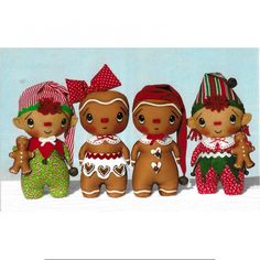 three gingerbread men and two women are standing next to each other